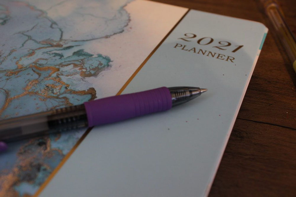 Image of 2021 planner calendar with pen