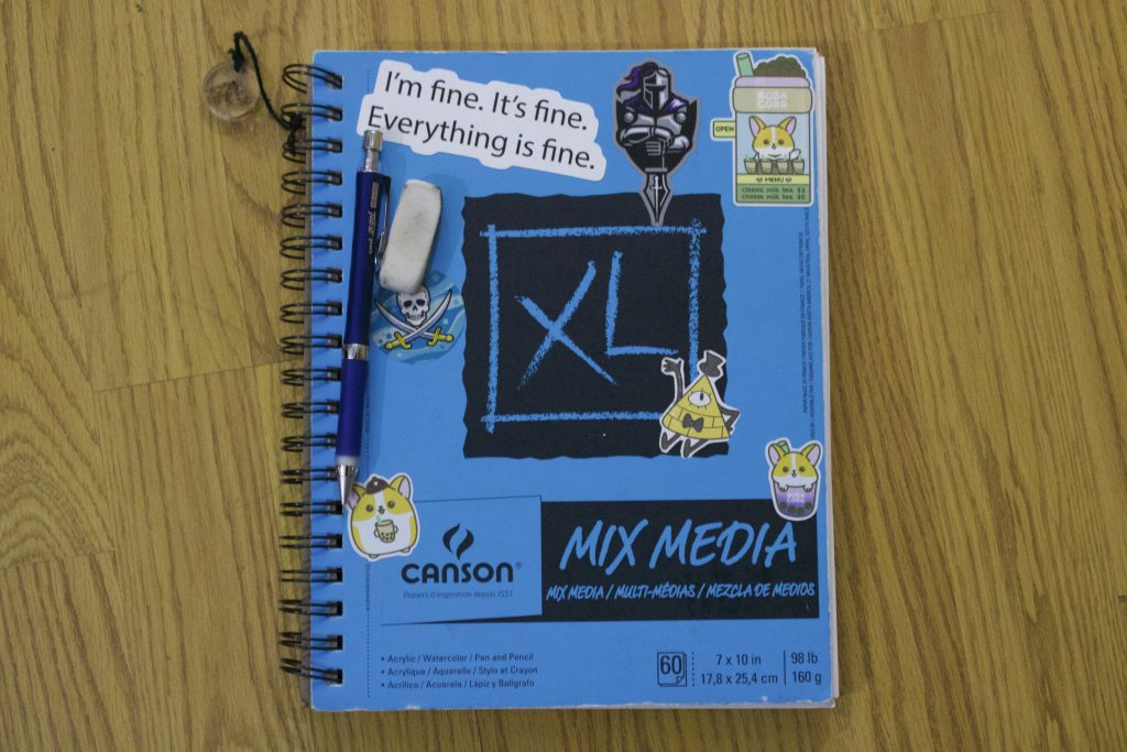 Photo of my sketchbook as a self-portrait.