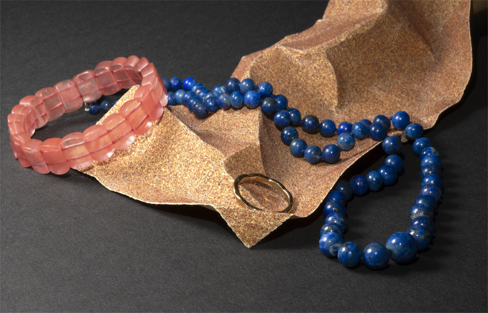 My final conceptual photo of sandpaper and jewelry