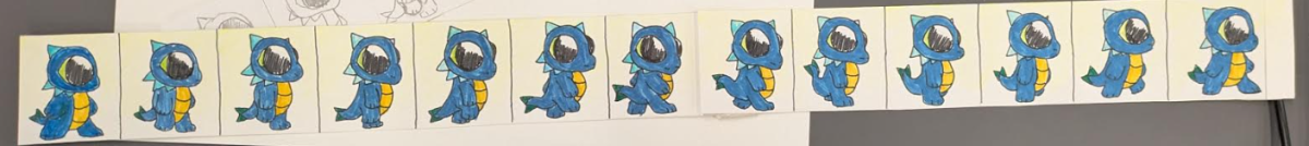 a long strip of paper for a Zoetrope; the long strip of papercontains a blue dragon walking