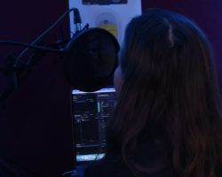 Singing in the booth! Abi singing in the recording booth