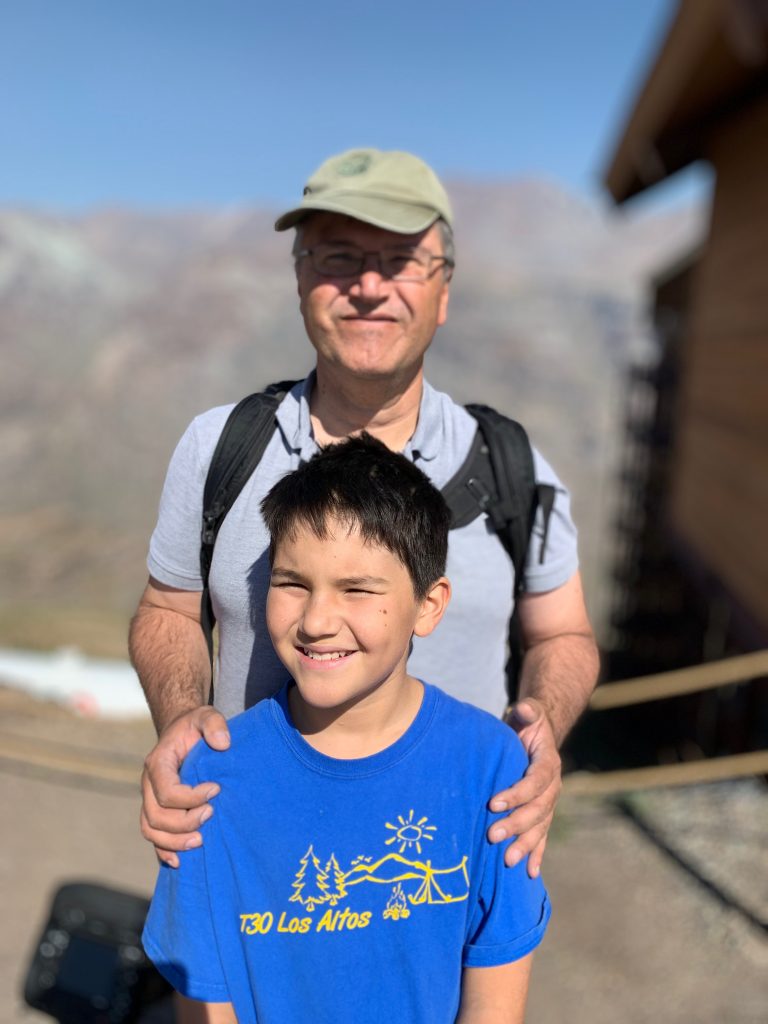 Father standing with child