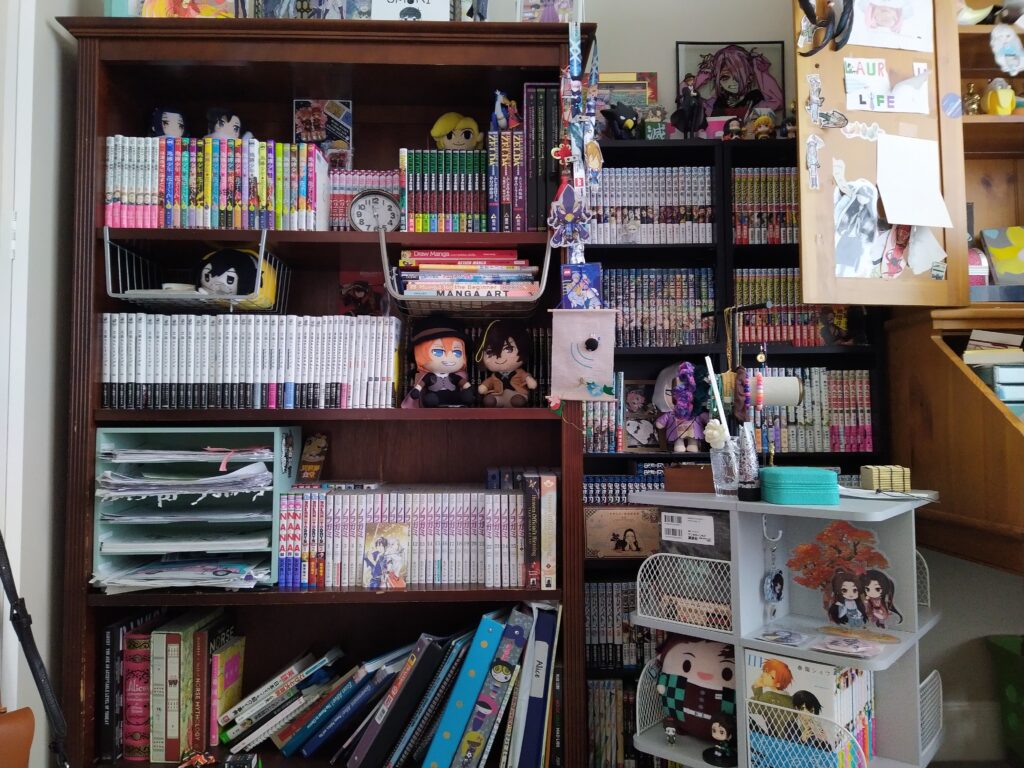 My four shelves. All of them are filled with manga. 