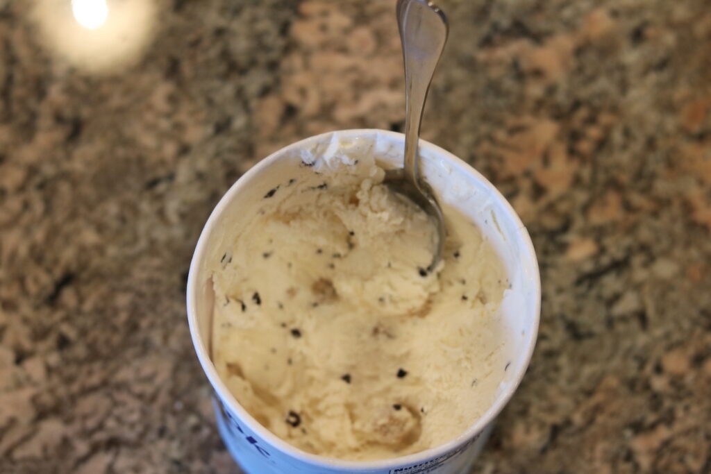 ice cream tub with spoon inside