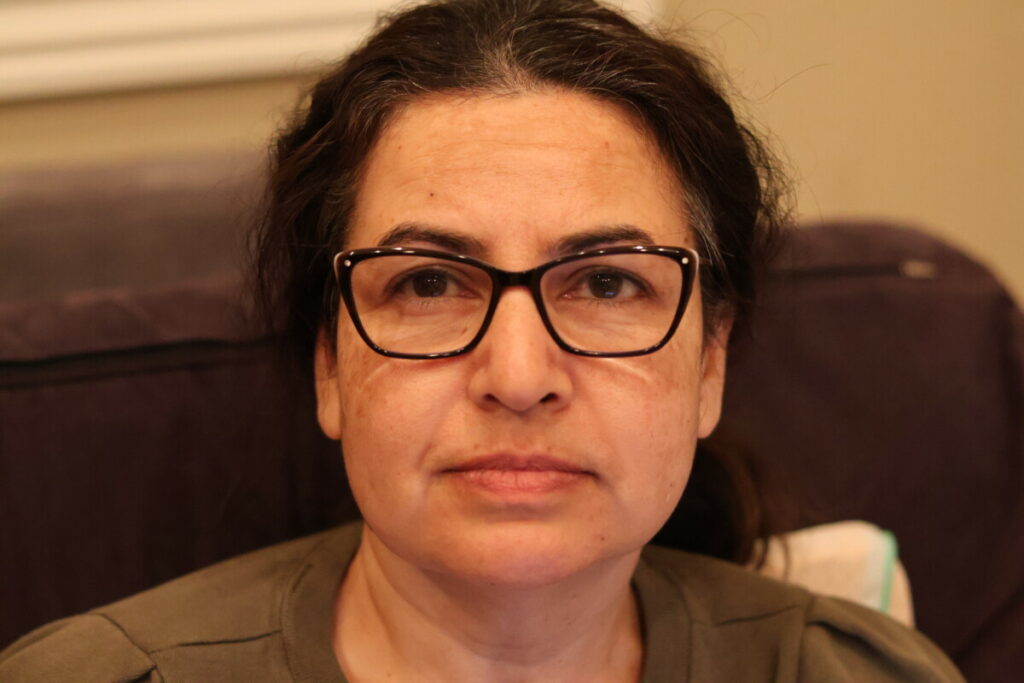 pic of woman in glasses looking into camera