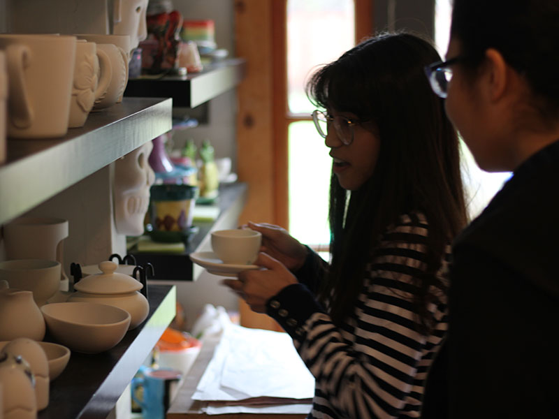 my friends looking at some pottery peices