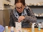 My mom painting her mug
