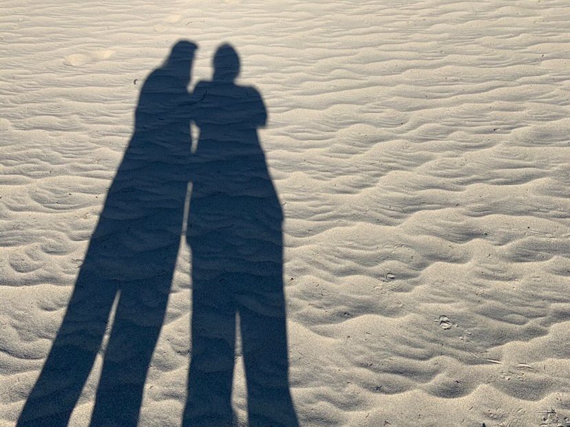 People shadow on sand