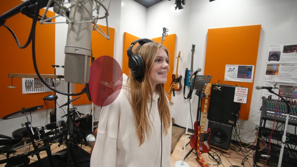 Two girls singing 
