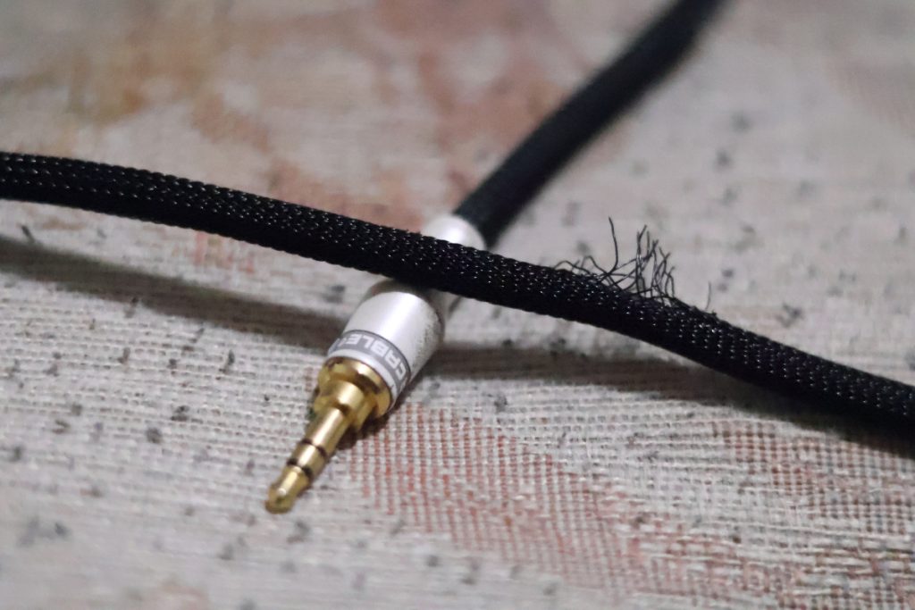 A frayed black wire