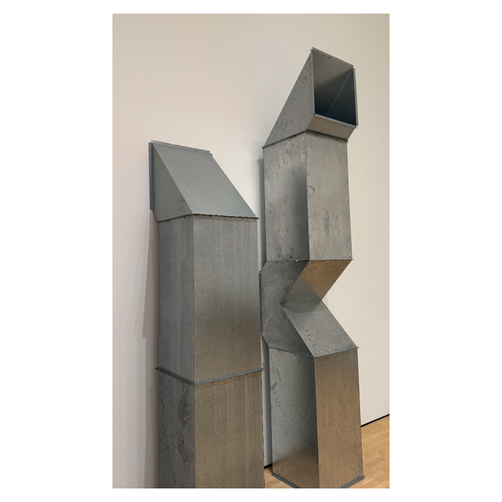 Image of steel tubes connected to a wall