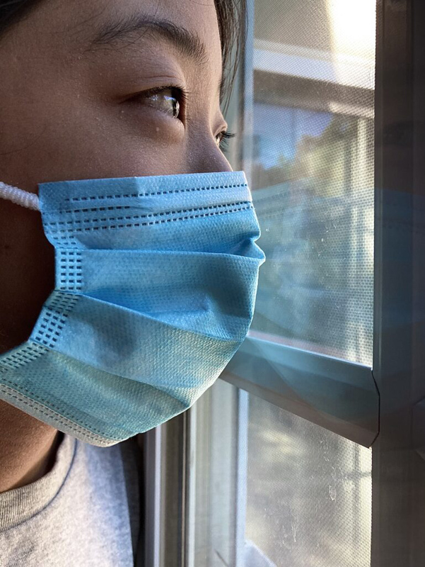 For this week's assignment, we were challenged to show our depiction of the current events. I chose a picture of a person looking out the window with a mask on, in order to represent the abnormality that became a part of everyone's lives.