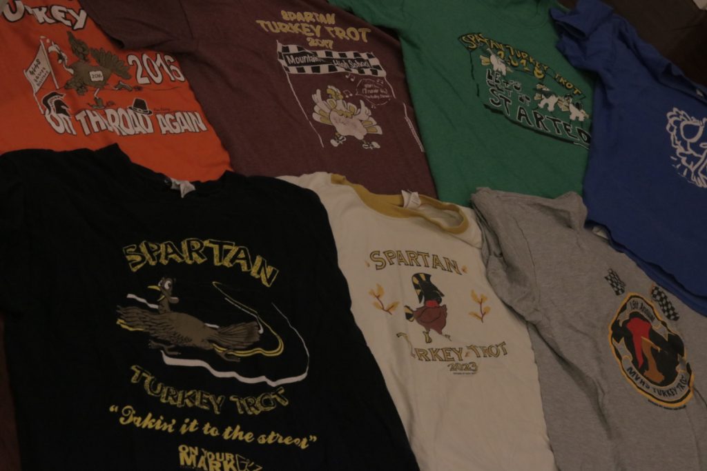 Layout of Turkey Trot shirts from countless years.