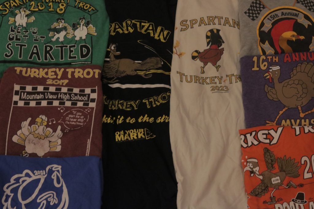 Layout of Turkey Trot shirts from countless years.