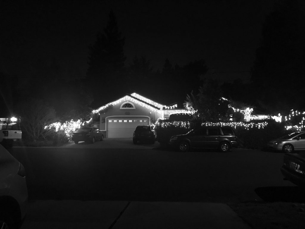 An image of a house with Christmas lights.
