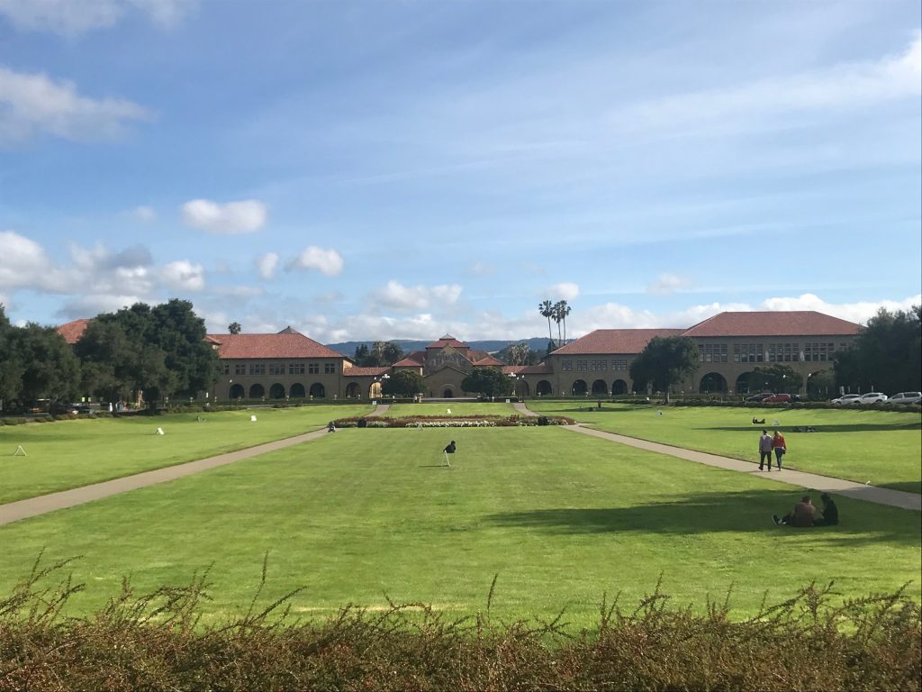 This is a picture of Stanford campus with the sidewalks leading to the church.