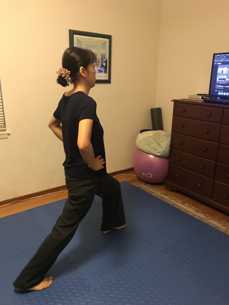 A picture of my mom exercising to stay active during quarantine.