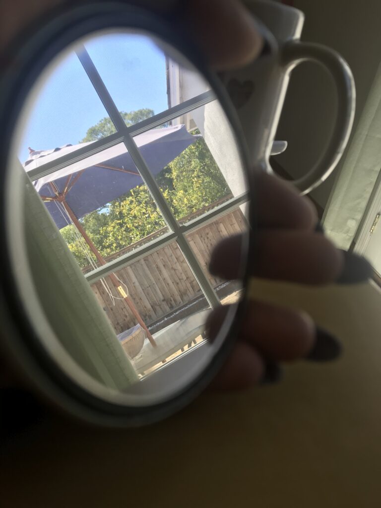 Photo of outside using a mirror as a prop.
