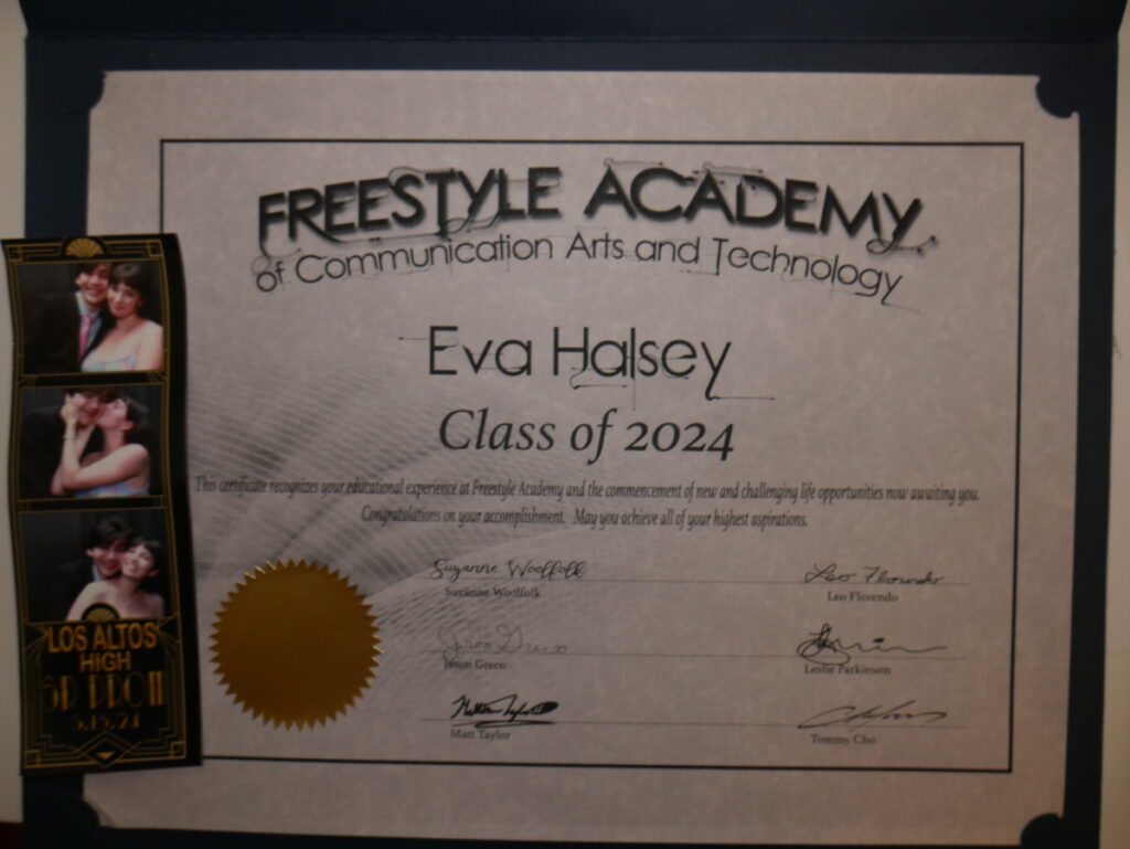 Diploma and photobooth picture