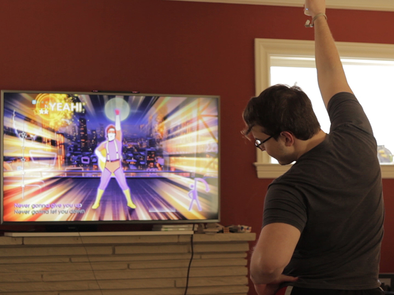 My brother playing Just Dance on the Wii