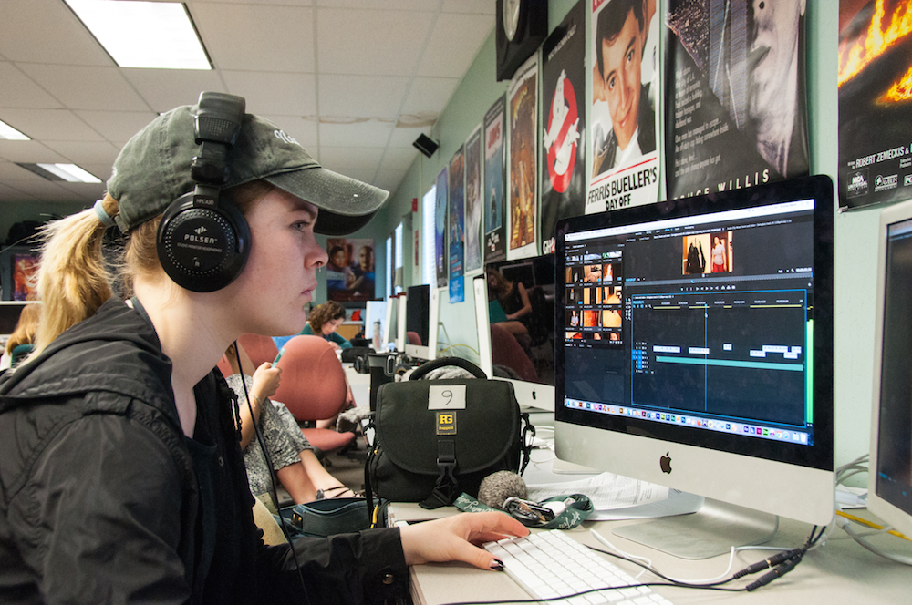 Brooke editing film using Premiere