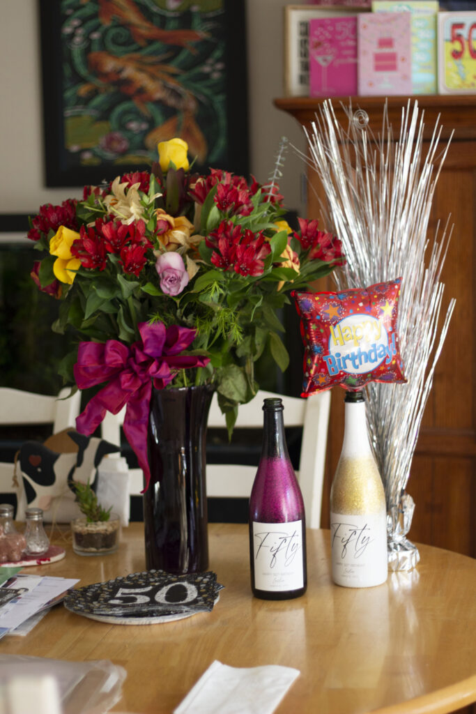 wine and flowers at the table