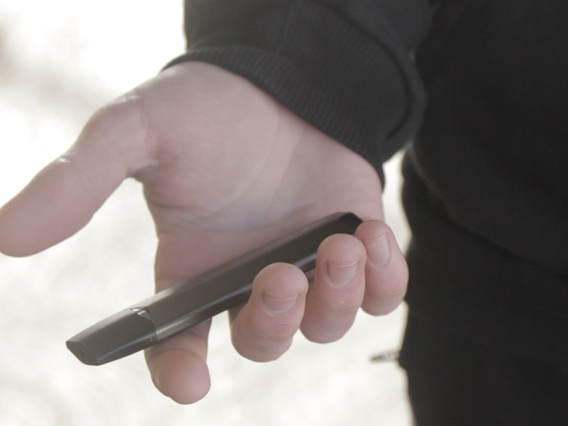 A highschool student shows off their Infinix