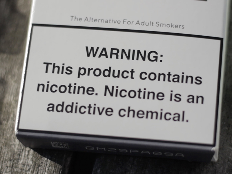 The warning label that is required on any nicotine product