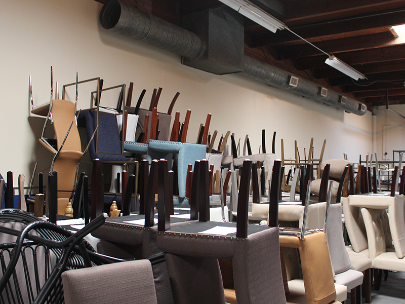 The storage of chairs in the warehouse.