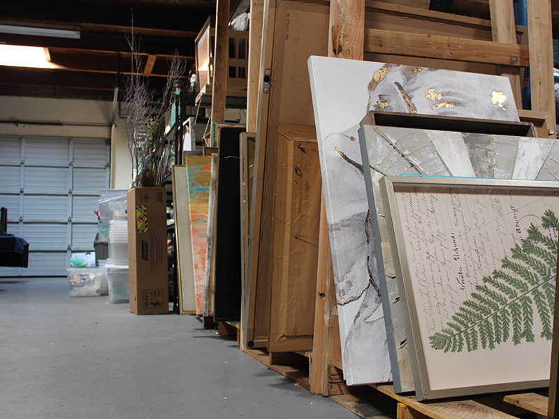 Paintings being stored in the warehouse.