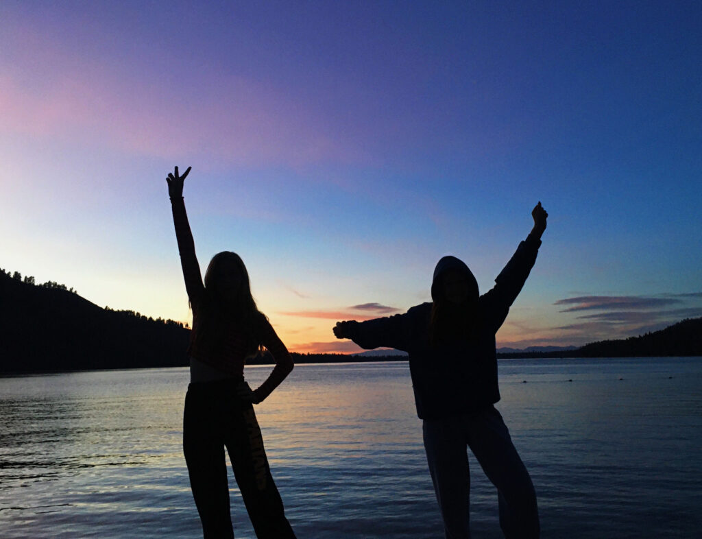 Silhouettes of and my friend at Fallen Leaf Lake during sunset
