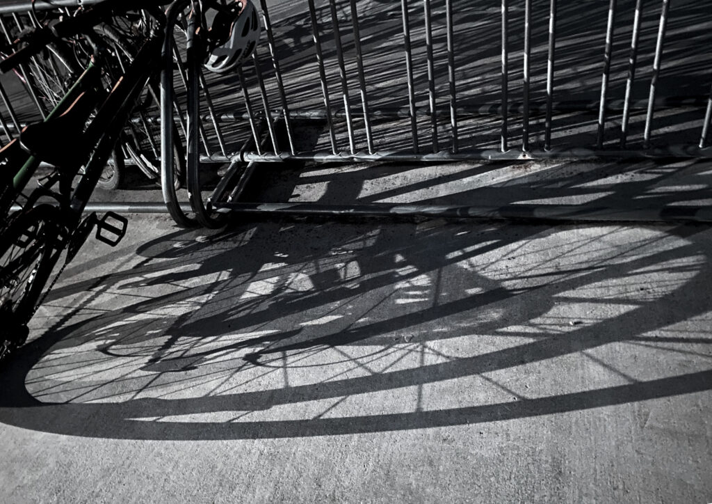 Shadows of multiple bikes overlapping