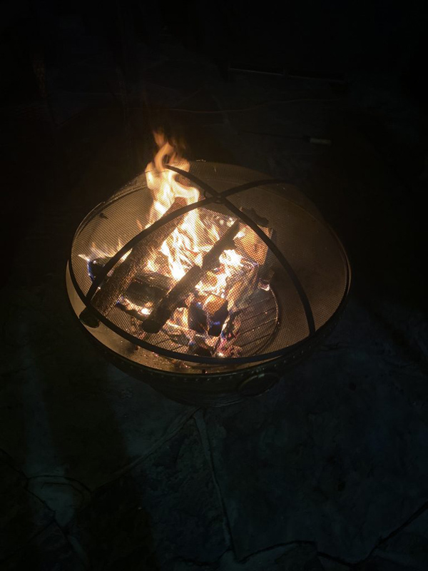 A fire, in a firepit, at night!