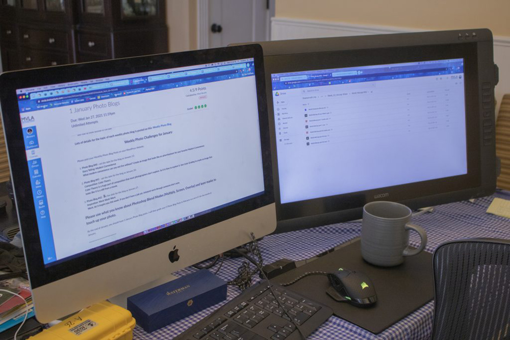 A dual-monitor computer setup, showing the various Weekly Photo Challenges due for January, as well as some documents in a Google Drive folder