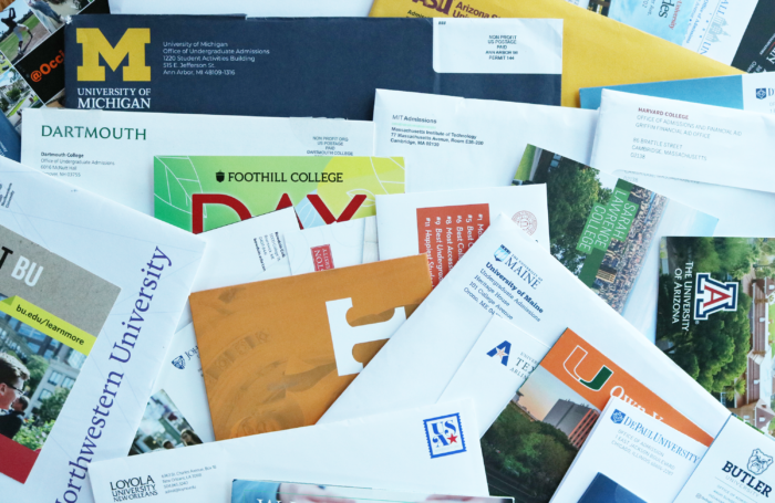 a stack of college mail in a collage-style photo