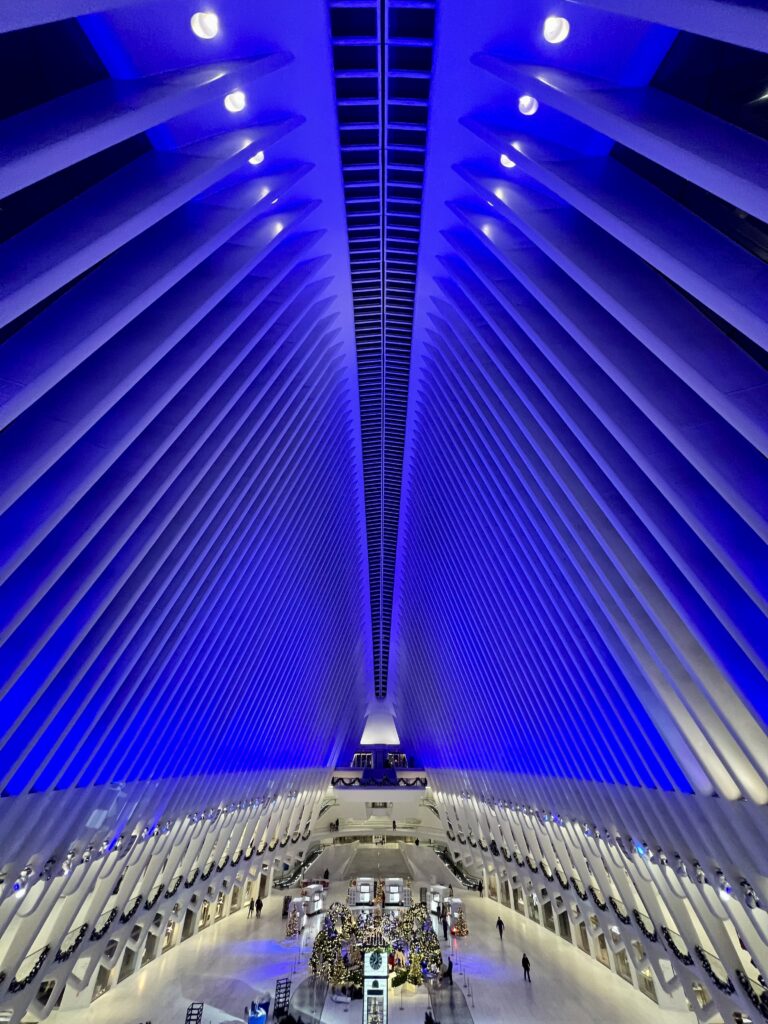 new york city subway station with blue lighting 