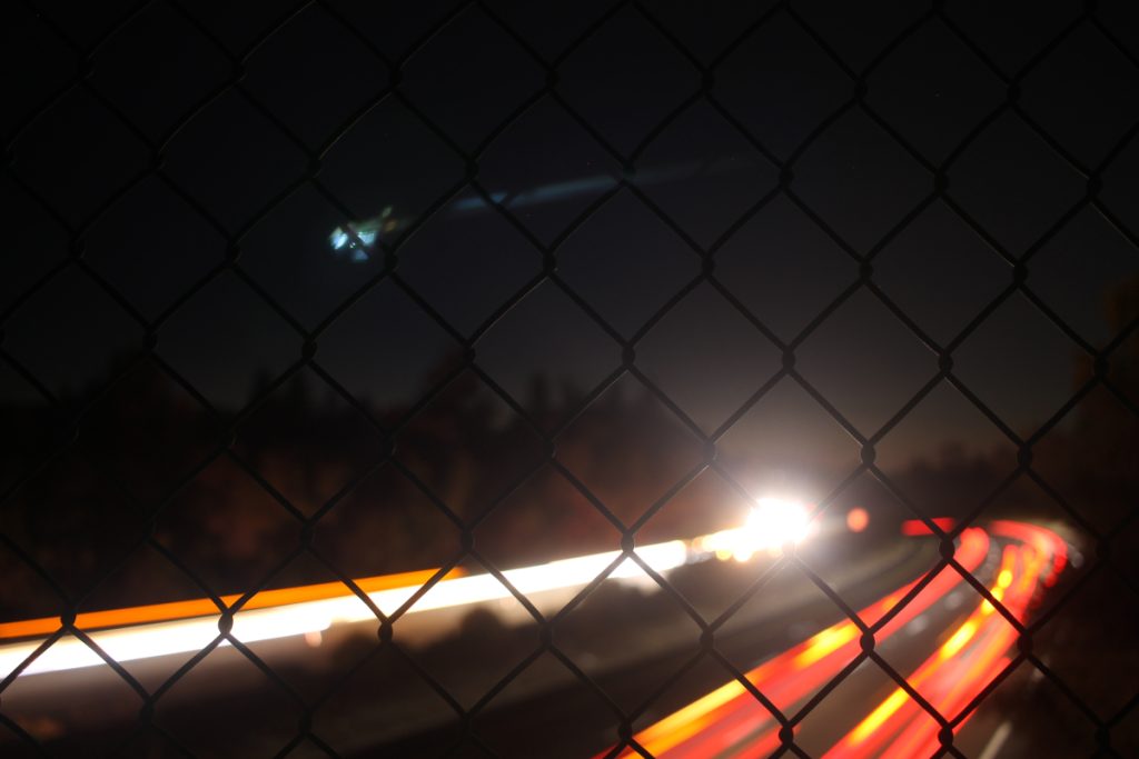 Photo of freeway at night.