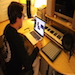 Scott Delamare producing music at his at home studio.