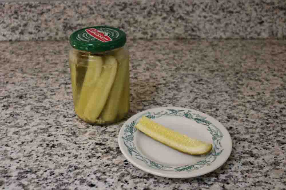 A photo of a jar of pickles.