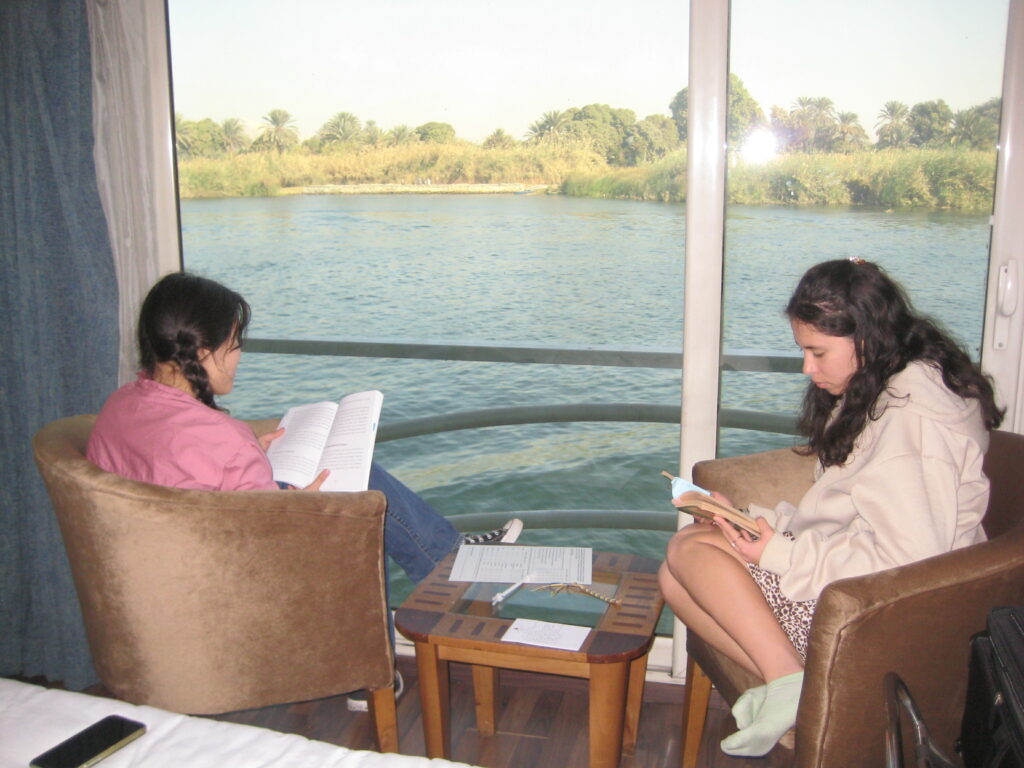 my sister and I reading our books in Egypt.