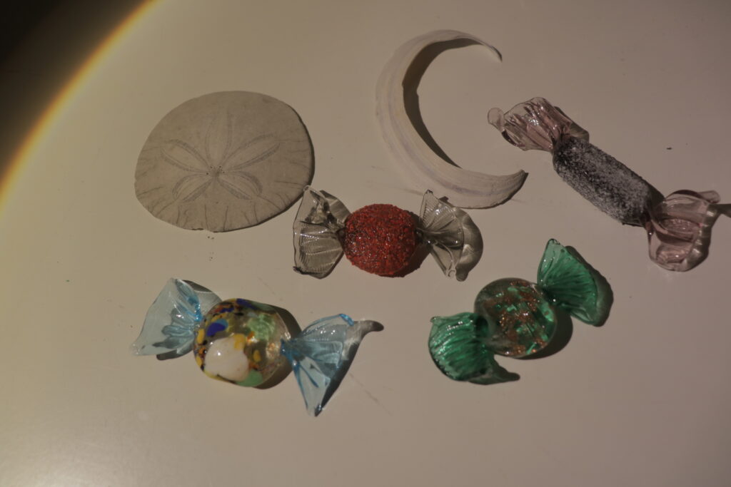 glass pieces of candy with seashells.