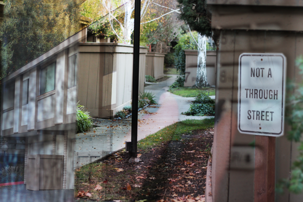 A combination of numerous photos of my neighborhood such as signs and buildings. 