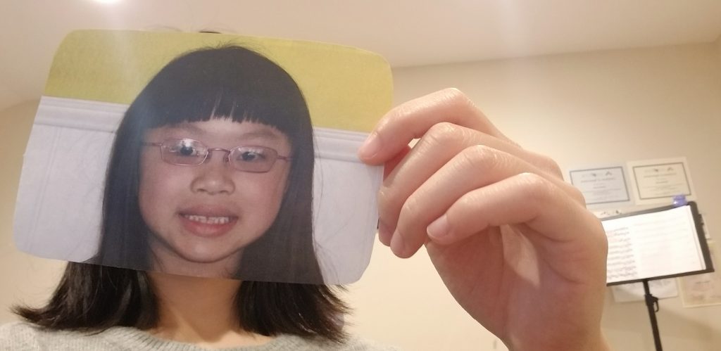 A photo of me holding a photo of me