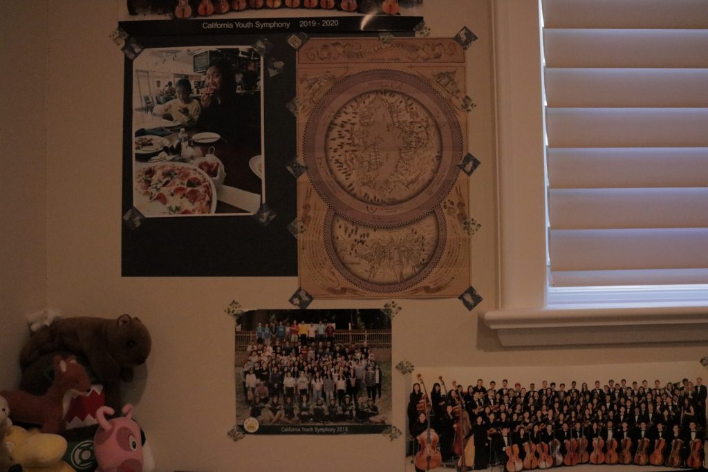 Featured image: A picture of my best friend, Harry Potter merchandise, and photos of my orchestra. 